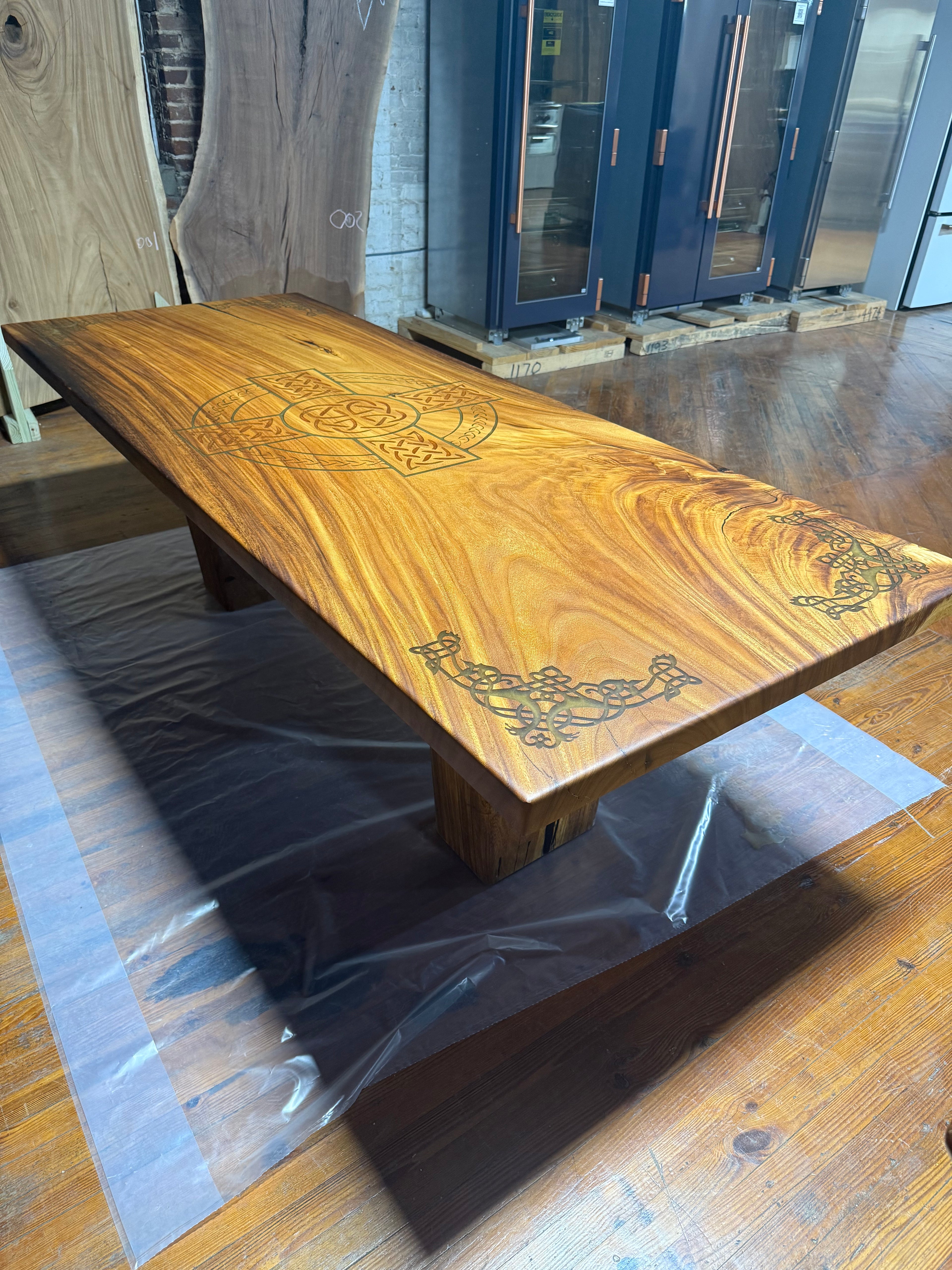 Custom Celtic Live edge Slab table with resin inlay and stiletto legs
