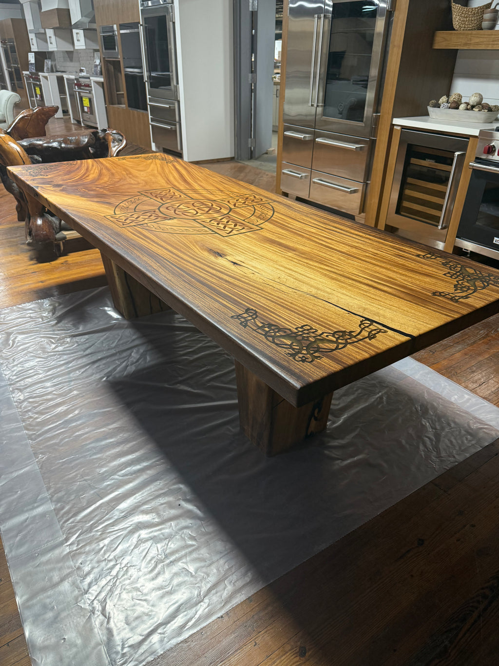 Custom Celtic Live edge Slab table with resin inlay and stiletto legs